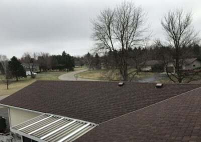 completed roof replacement project with new shingles