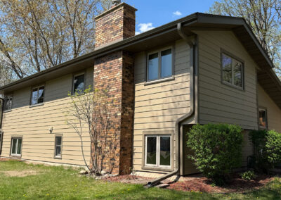 home with new siding, gutters, trim, facia, soffit and roof