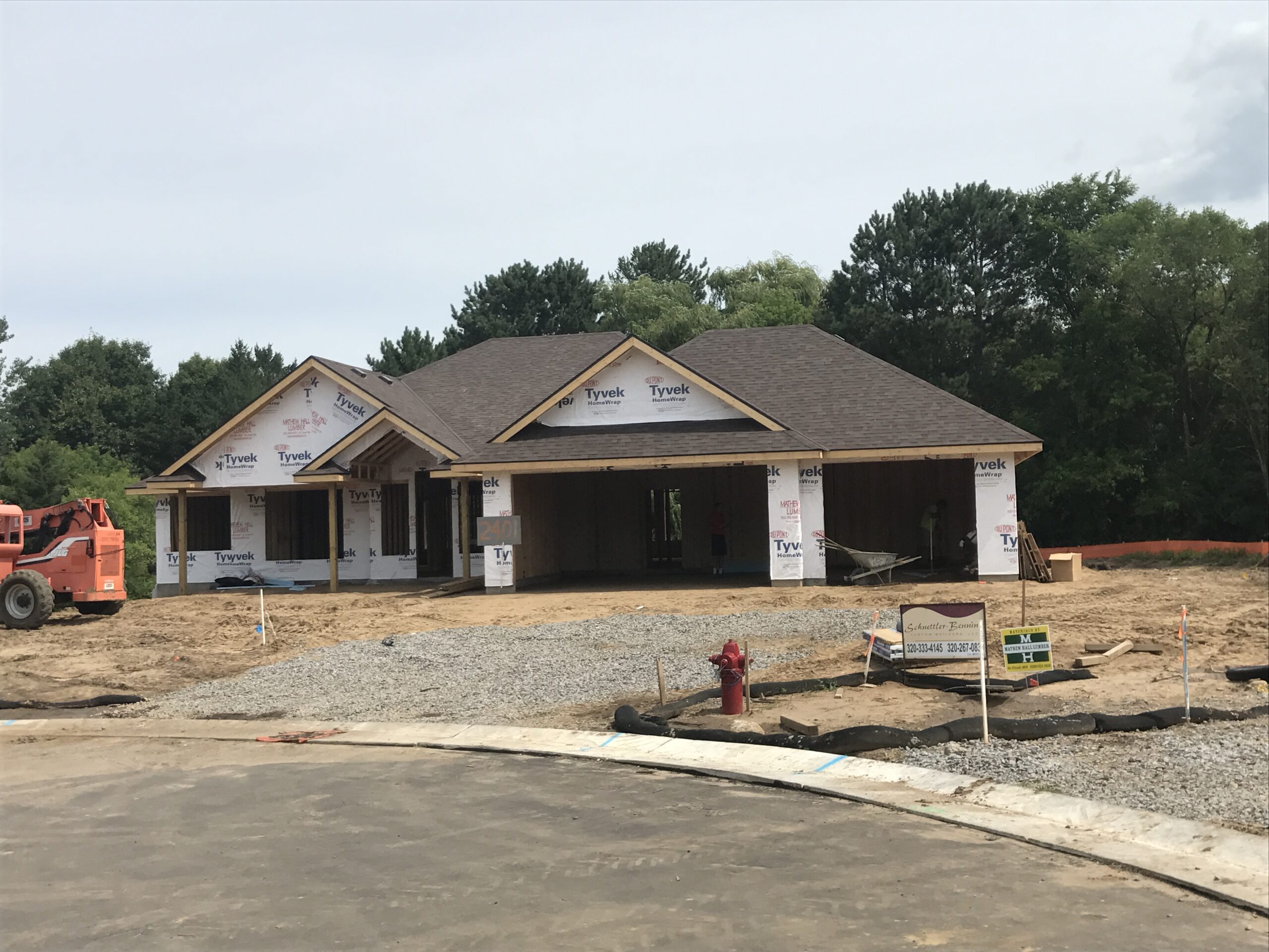new build with new roof being prepped for siding