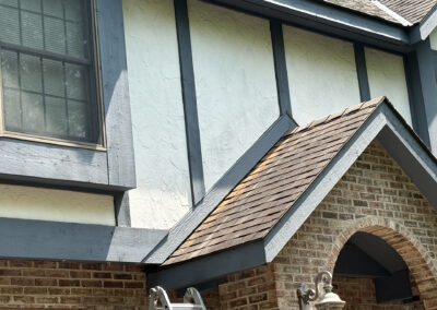 repaired storm damage to roof gable trim