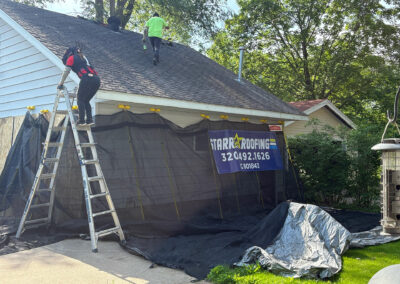 crew making preparations for garage roof tear-off