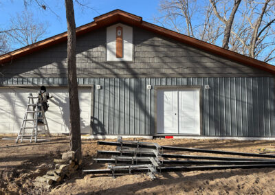 out building, shop, garage with new steel siding and steel shake